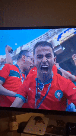 Brazil-Morocco soccer match watched on TV in Colorno