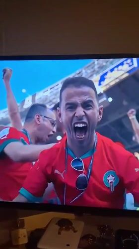 Brazil-Morocco soccer match watched on TV in Colorno