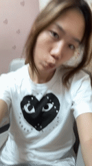 Woman films playful selfies with plush toys in Shapingba