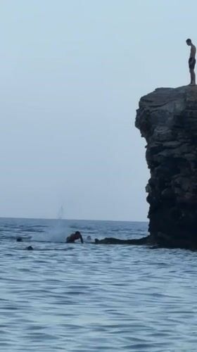 Cliff diving into the Adriatic off the Budva coastline.