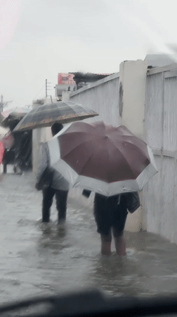 Knee-deep flooding hits Igboefon streets during heavy rain