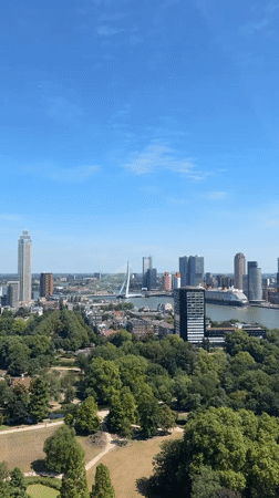 Aerial tour of Rotterdam's waterfront, harbor, and river infrastructure