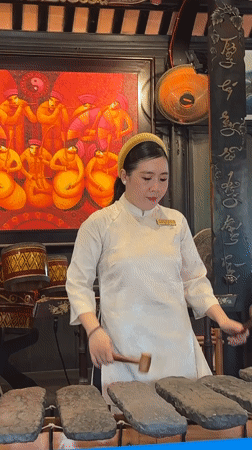 Stone xylophone performance in traditional dress, Nha Trang