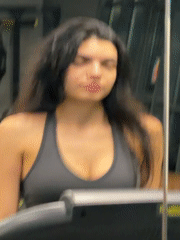 Woman exercises at Sofia gym during evening workout session