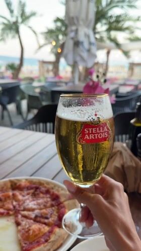 Evening dining captured at Nesebar beachfront restaurant