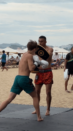 Muay Thai pad work on a Nha Trang beach