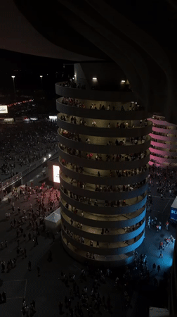 Packed outdoor concert lights up Milan on a summer night