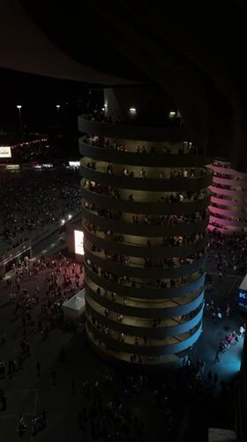 Packed outdoor concert lights up Milan on a summer night