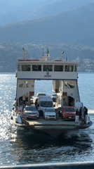 Ferry ADDA carries cars across Lake Como near San Giovanni