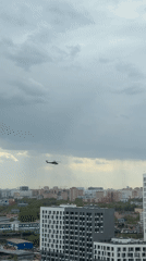 Military helicopter flies over Lyubertsy, Russia