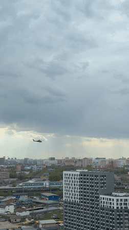 Military helicopter flies over Lyubertsy, Russia