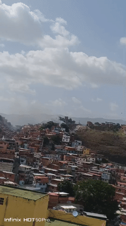Smoke spotted over hillside neighborhood in Caracas
