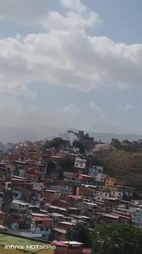 Smoke spotted over hillside neighborhood in Caracas