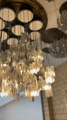 Interior gathering documented in Kyiv building with distinctive chandeliers