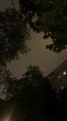 Moscow resident documents heavy nighttime rainstorm from multiple angles