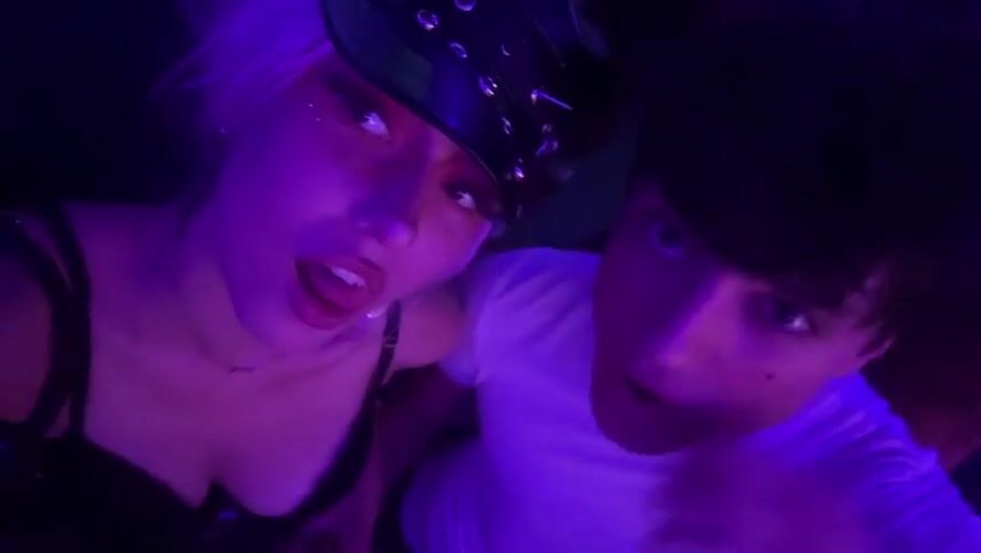 Drag performers light up a Milan club stage at night