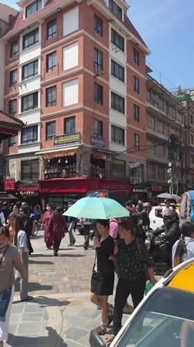 Street scene captured in busy Kathmandu neighborhood