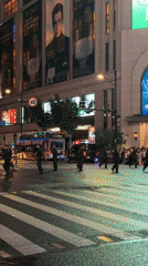 Armored vehicles and uniformed personnel deployed on Shanghai's Nanjing Road