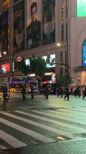 Armored vehicles and uniformed personnel deployed on Shanghai's Nanjing Road