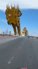 Motorbike rider crosses iconic Dragon Bridge in Da Nang
