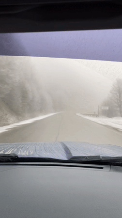 Driver records wet road conditions near Lago Escondido, Argentina