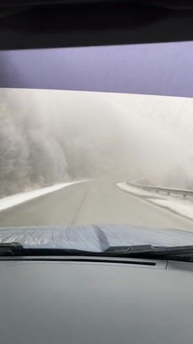 Driver records wet road conditions near Lago Escondido, Argentina