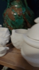 Handmade crafts and ceramic figures browsed at a Wedel shop