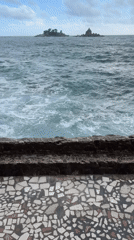 Large waves crash against seawall in Petrovac, Montenegro