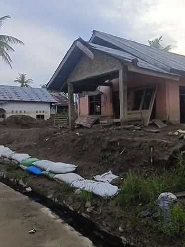 Flood or landslide damage across Meunasah Raya village