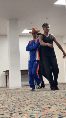 Dance rehearsal in a Porlamar studio, late evening.