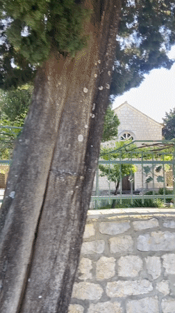 Stone church photographed from multiple angles in Montenegro village