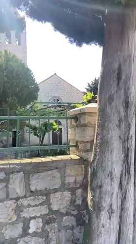 Stone church photographed from multiple angles in Montenegro village