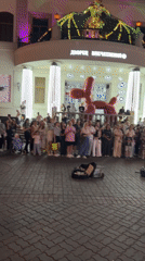 Live guitar and balloon art draw a crowd on Kazan cobblestones