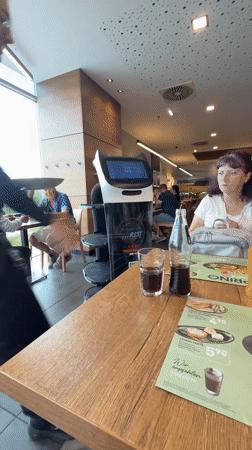 Service robots, interactive displays spotted at German furniture store