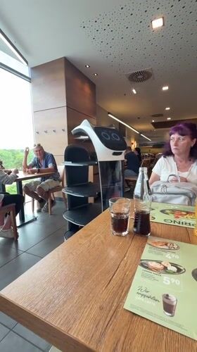 Service robots, interactive displays spotted at German furniture store