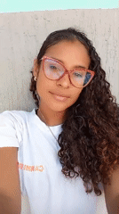 Woman takes selfies in Juan Griego, Venezuela
