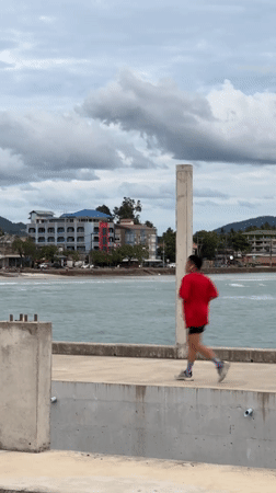 Ko Samui pier and market buzzing on a cloudy morning