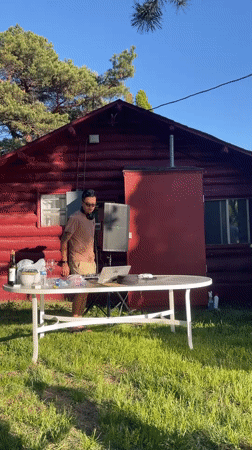 Outdoor party observed in Charlevoix backyard during sunny weather