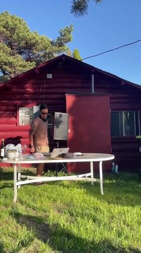 Outdoor party observed in Charlevoix backyard during sunny weather