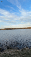 Man documents lake visit in Aleksandrovka, Russia