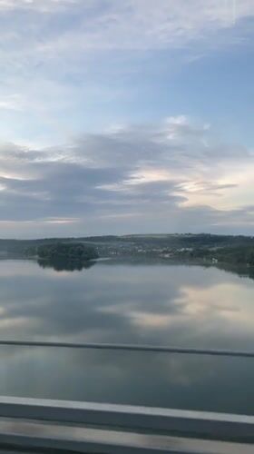Early morning river and misty field views captured in Serbia