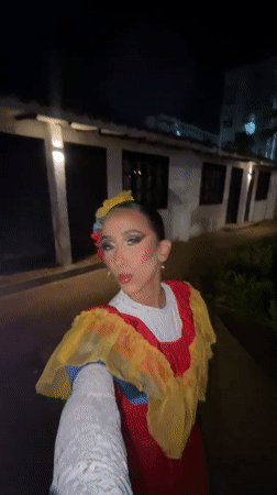 Folk dance show and crowd participation in Porlamar at night