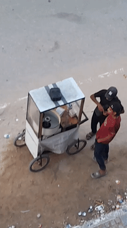Everyday street life in Khan Yunis on a July afternoon