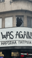 Political graffiti documented on Belgrade building