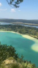 Turquoise lake views from a Jura overlook, La Chaux-du-Dombief
