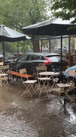 Heavy rainfall soaks Novi Sad streets, cafes during afternoon