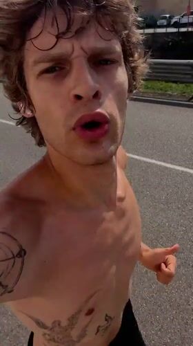 Jogging through Milan streets, mid-motion and mid-word