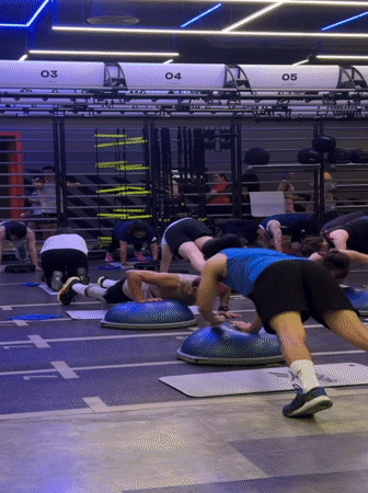 Group fitness class in full swing at a Chiang Mai gym