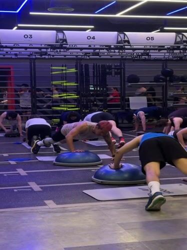 Group fitness class in full swing at a Chiang Mai gym