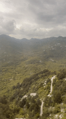 Mountainous landscape documented in rural Montenegro under overcast skies